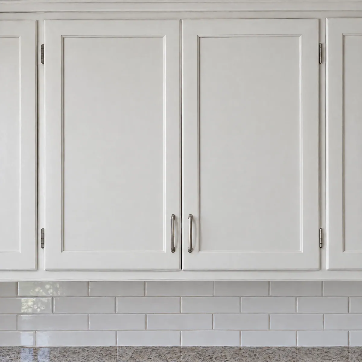 White kitchen upper cabinets with solid shaker doors